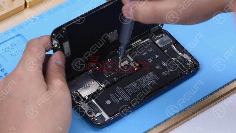 After the screen is lifted, take the shielding covers off, disconnect the battery, and remove the screen.