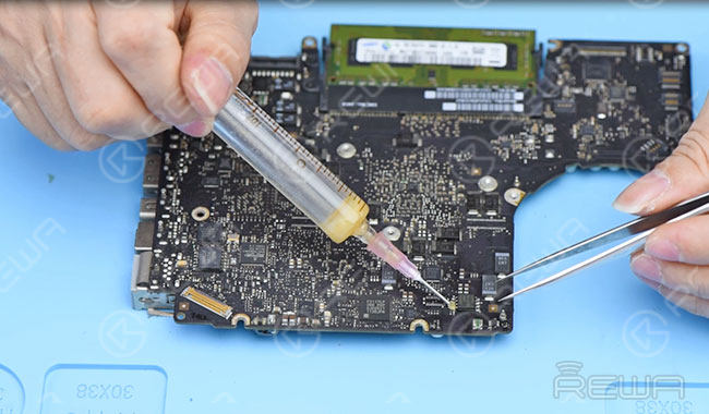 Solder the chip to the logic board, then clean with PCB cleaner.
