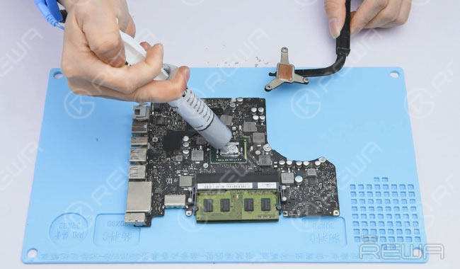 Apply some thermal paste and install heat sink.